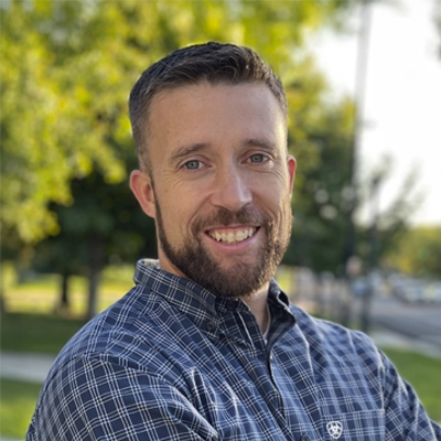 A headshot of Dr. Devin Orton, a chiropractor at Foundational Healing & Sport Clinic