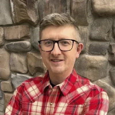 A headshot of Dr. Kristin Planinz, a chiropractor at Foundational Healing & Sport Clinic